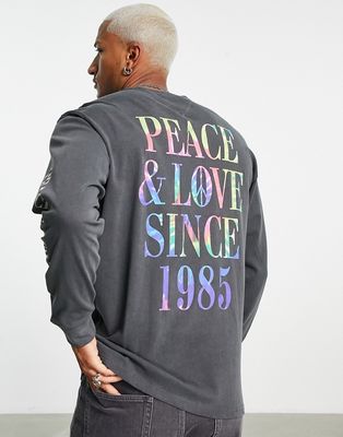 Tommy Jeans peace and love tie dye back print long sleeve top relaxed fit in black