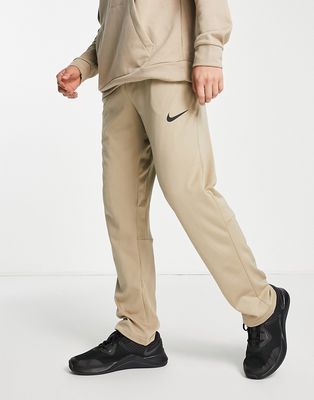 Nike Training Epic Knit pants in sand-White