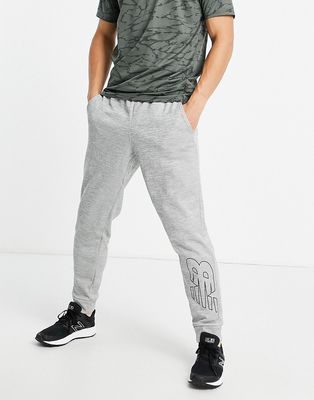 New Balance Tenacity sweatpants with logo in gray-Grey