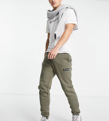 Columbia Cliff Glide sweatpants in green Exclusive at ASOS