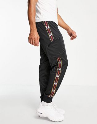 Fila sweatpants with taping in black