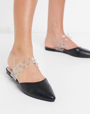 London Rebel pointed flat mule with studs in black