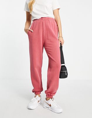 Carhartt WIP relaxed sweatpants with bum logo - part of a set-Pink