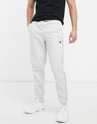 Puma x Helly Hansen logo taped sweatpants in gray-Grey