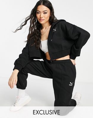 Puma oversized pleated sweatpants in black - exclusive to ASOS