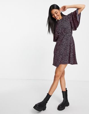 AX Paris mini skater dress with flutter sleeves in navy and pink polka dot