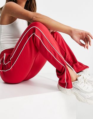 Guess track pant in red - part of a set