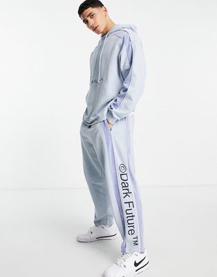 ASOS Dark Future relaxed fixed hem sweatpants with velour panels and logo print in light blue - part of a set-Blues