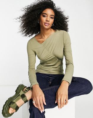 & Other Stories asymmetric long sleeve top in green