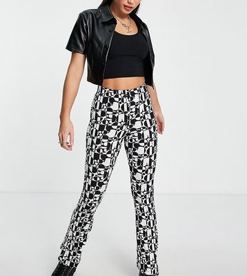 Topshop Tall retro checkerboard flared pant in black & white