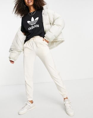 adidas Originals 'Relaxed Risque' velour sweatpants in off white