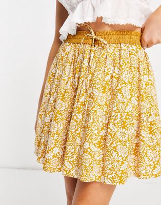 En Crème mini pleated skirt in yellow paisley with tie waist set