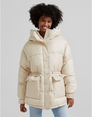 Bershka oversized nylon padded jacket with hood in beige-Neutral