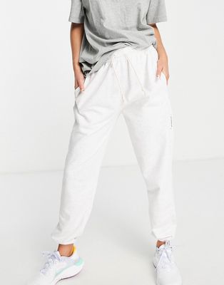 Nike Basketball Standard Issue cuffed fleece sweatpants in white