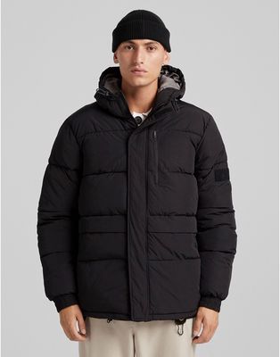 Bershka hooded puffer jacket in black