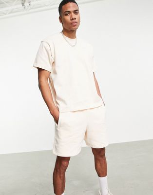 adidas Originals x Pharrell Williams premium t shirt in ecru-Neutral