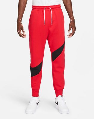 Nike Swoosh Pack cuffed sweatpants in red