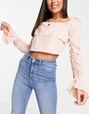 Femme Luxe puff long sleeve top with drape front in blush-Pink