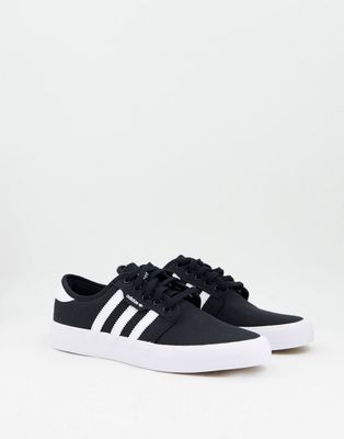 adidas Originals Seeley sneakers in black and white