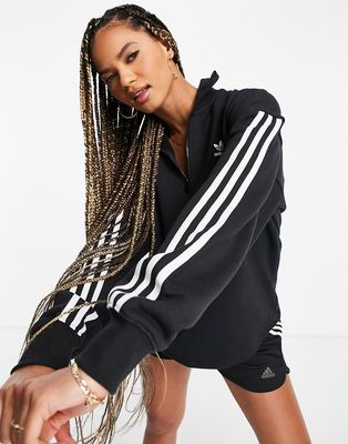 adidas Originals adicolor three stripe quarter zip sweatshirt in black