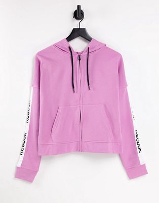 Reebok training essentials linear logo full zip hoodie in pink
