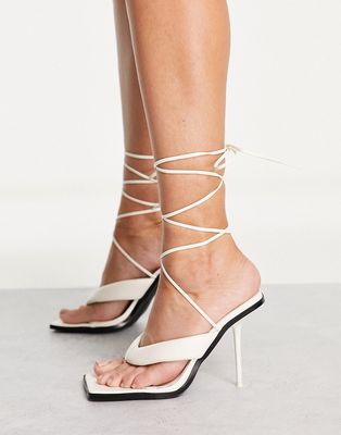 Public Desire Grand heeled sandals with toe post in off-white