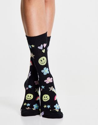 ASOS DESIGN calf length socks with 90's print in black