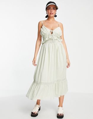 ASOS DESIGN textured midi sundress with shirred waist and lace in sage green