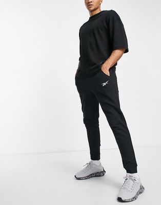 Reebok training essentials linear logo sweatpants in black