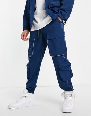 Topman relaxed nylon four pocket cargo pants in blue - part of a set