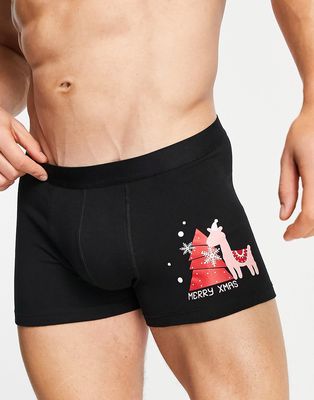 ASOS DESIGN Christmas trunks in black with llama placement print