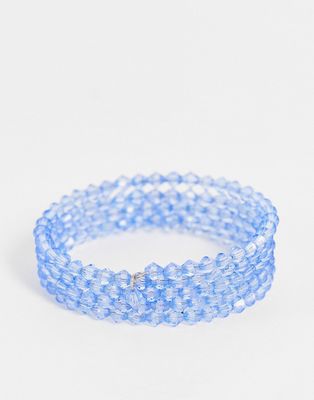 ASOS DESIGN cuff bracelet with blue faceted beads in wraparound design