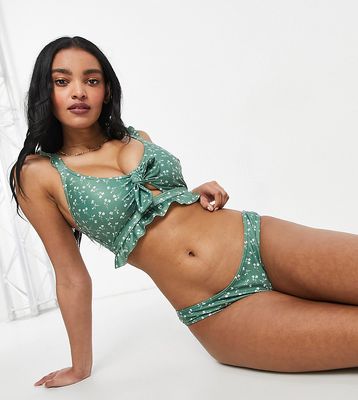 Peek & Beau fuller bust Exclusive high leg bikini bottom with frill detail in green floral