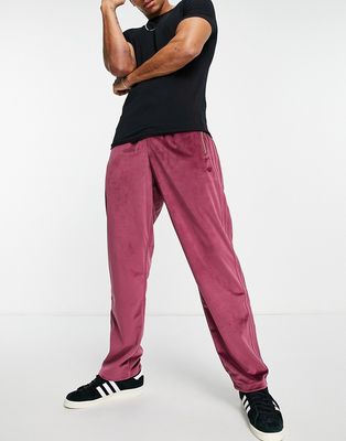 adidas Originals Firebird velour track pant in crimson-Red