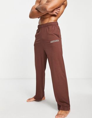 ASOS DESIGN Essentialwear lounge sweatpants in brown