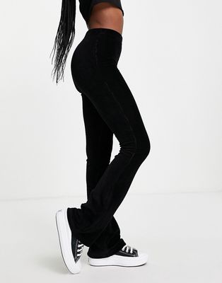 Topshop stretchy cord flared pants in black