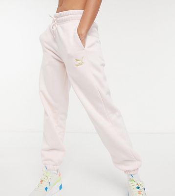 Puma oversized sweatpants in pink and gold