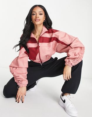 Reebok x Cardi B vector track jacket in pink and red