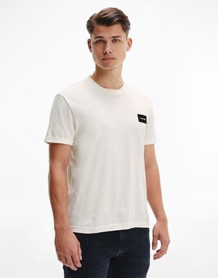 Calvin Klein turn-up sleeve badge logo T-shirt in cream-White