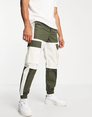 Topman relaxed cut and sew panelled cargo pants in khaki-Green