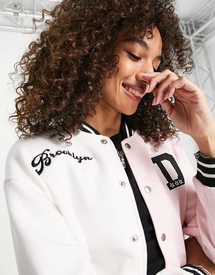 I Saw It First spliced varsity jacket in pink