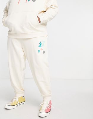 ASOS Daysocial oversized sweatpants with board game graphic prints and logo in off white - part of a set