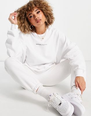 ASOS Weekend Collective oversized sweatshirt with back logo in white