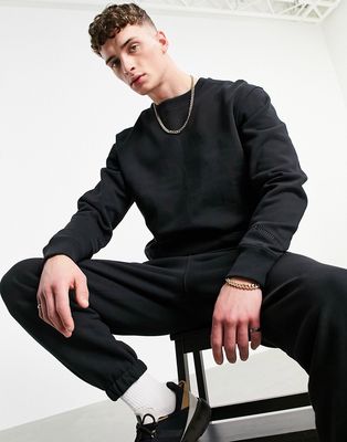 adidas Originals x Pharrell Williams premium sweatshirt in black