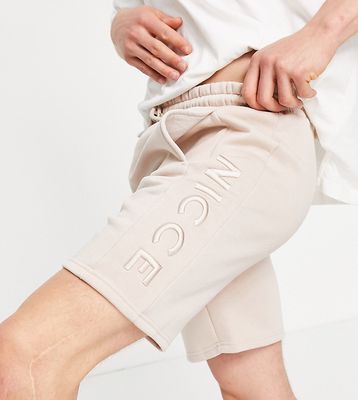 Nicce mercury embroidered shorts in beige exclusive to ASOS-Neutral