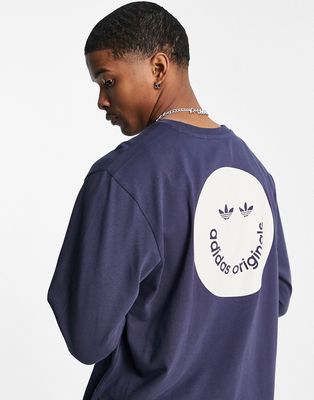 adidas Originals long sleeve top in navy with smile back print