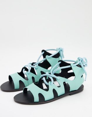 Asra Savannah flat sandals with ankle tie in turquoise-Blues