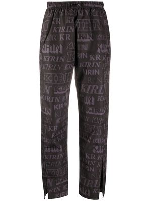 Kirin logo-print slit trousers - Black
