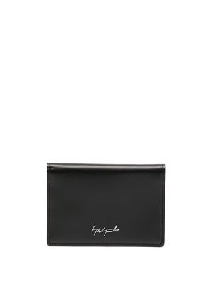 Discord Yohji Yamamoto logo-print bi-fold leather wallet - Black
