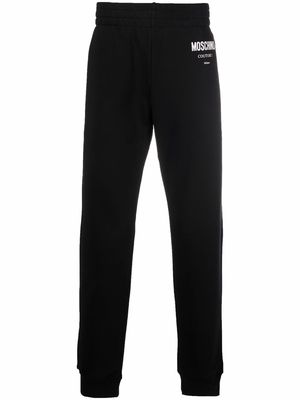 Moschino logo-print slim-cut track pants - Black